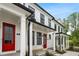 Beautiful new townhomes boast modern farmhouse exteriors with covered entrances at 58 Black Gum Ln # 47, Auburn, GA 30011