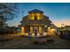 Community patio offers cozy seating around a fire pit for relaxing evenings outdoors at 58 Black Gum Ln # 47, Auburn, GA 30011