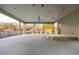 Spacious outdoor pavilion area with a high ceiling, ceiling fans, a wooden platform stage, and views of the natural surroundings at 58 Black Gum Ln # 47, Auburn, GA 30011