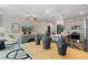 Spacious living area showcasing an open layout to the kitchen, and stylish decor for a welcoming feel at 312 Navigator Ln, Mcdonough, GA 30253