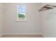 Walk-in closet with wire shelving and a window for natural light at 312 Navigator Ln, Mcdonough, GA 30253
