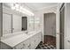 Bright bathroom with an extended vanity and a large mirror at 3203 Lenox Ne Rd # 3, Atlanta, GA 30324