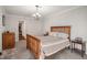 Comfortable bedroom with a wooden bed frame, and a closet close by at 3203 Lenox Ne Rd # 3, Atlanta, GA 30324