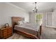 Cozy bedroom with natural light, carpet, and wood furnishings at 3203 Lenox Ne Rd # 3, Atlanta, GA 30324