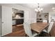 Open-concept dining room that flows into the updated kitchen area and spacious living room at 3203 Lenox Ne Rd # 3, Atlanta, GA 30324