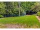 Expansive green space with manicured lawn and surrounding trees and shrubbery providing a serene outdoor environment at 3203 Lenox Ne Rd # 3, Atlanta, GA 30324