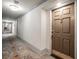 Well-lit hallway leading to unit with decorative carpet and neutral wall colors at 3203 Lenox Ne Rd # 3, Atlanta, GA 30324
