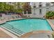 Community pool with lounge seating available to all residents for recreational use at 3203 Lenox Ne Rd # 3, Atlanta, GA 30324