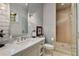 Elegant bathroom with walk-in shower, marble countertop vanity, and stylish fixtures at 3540 Tuxedo Nw Rd, Atlanta, GA 30305