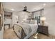 Comfortable bedroom featuring a ceiling fan, hardwood floors, and a serene ambiance at 3540 Tuxedo Nw Rd, Atlanta, GA 30305