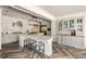 Spacious kitchen with island featuring seating, abundant counter space and custom cabinetry at 3540 Tuxedo Nw Rd, Atlanta, GA 30305