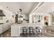 Bright kitchen with seating at the island and lots of light and custom cabinets at 3540 Tuxedo Nw Rd, Atlanta, GA 30305