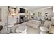 Cozy living room featuring built-in shelving, a fireplace, and comfortable seating at 3540 Tuxedo Nw Rd, Atlanta, GA 30305