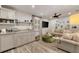 Cozy living room with kitchenette, comfortable seating, and stylish decor at 3540 Tuxedo Nw Rd, Atlanta, GA 30305
