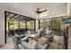 Outdoor patio features a stone fireplace, comfortable seating, and a shady pergola at 3540 Tuxedo Nw Rd, Atlanta, GA 30305