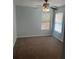 Bedroom featuring a ceiling fan and windows at 8236 Eastshore Dr, Union City, GA 30291
