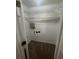 A functional closet with carpet flooring and shelving at 8236 Eastshore Dr, Union City, GA 30291