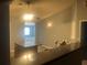 Open kitchen view features an island, a breakfast bar, and easy access to the adjacent room at 8236 Eastshore Dr, Union City, GA 30291