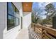 Balcony view showcasing wood railing, window, and the exterior siding at 1800 Charles Nw Pl, Atlanta, GA 30318