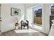 Balcony view with a comfortable chair, a side table, and sliding door access at 1800 Charles Nw Pl, Atlanta, GA 30318