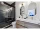 Modern bathroom features double sinks, sleek fixtures, and a glass-enclosed shower at 1800 Charles Nw Pl, Atlanta, GA 30318