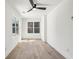 This bedroom has multiple windows offering great natural light and hardwood floors at 1800 Charles Nw Pl, Atlanta, GA 30318