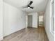 Spacious bedroom with hardwood floors, neutral walls, and a ceiling fan for added comfort at 1800 Charles Nw Pl, Atlanta, GA 30318