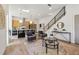 Bright open concept living area with modern finishes and a staircase leading to the upper level at 1800 Charles Nw Pl, Atlanta, GA 30318