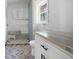 Bathroom under construction featuring herringbone tile floors and new vanity at 3042 Peek Nw Rd, Atlanta, GA 30318