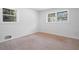 Neutral bedroom with hardwood floors and modern molding on large windows at 3042 Peek Nw Rd, Atlanta, GA 30318