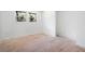 Neutral bedroom featuring hardwood floors and a large window at 3042 Peek Nw Rd, Atlanta, GA 30318