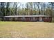 Lovely brick ranch home with a well-maintained lawn and charming curb appeal at 3042 Peek Nw Rd, Atlanta, GA 30318