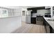 Eat-in kitchen features stainless steel appliances, modern backsplash and butcher block countertop at 3042 Peek Nw Rd, Atlanta, GA 30318
