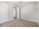 Bedroom with neutral walls and carpet and white trim, doors, and baseboards at 4062 Doster Sw Dr, Atlanta, GA 30331
