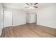 Open living space with wood-look flooring, neutral walls, and a ceiling fan for added comfort at 4062 Doster Sw Dr, Atlanta, GA 30331