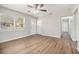 Comfortable living room with gleaming floors, neutral walls, and natural light from a large window at 4062 Doster Sw Dr, Atlanta, GA 30331