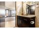 Bathroom featuring a granite vanity and a view to the adjacent living space at 795 Hammond 1013 Dr, Sandy Springs, GA 30328