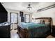 Bedroom with hardwood floors, natural light, and an industrial-style ceiling fan at 795 Hammond 1013 Dr, Sandy Springs, GA 30328