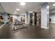 Bright fitness center with rubber floor, ample equipment, weight machines, and mirrored wall at 795 Hammond 1013 Dr, Sandy Springs, GA 30328