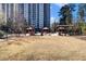 Exterior view of the community grilling and picnic area featuring grills, canopies, and seating at 795 Hammond 1013 Dr, Sandy Springs, GA 30328