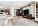 Inviting living room with a fireplace and television, leading to other areas in the condo at 795 Hammond 1013 Dr, Sandy Springs, GA 30328