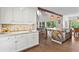 Bright kitchen with granite counters, stainless appliances, and access to the open floor plan at 417 Lynne Cir, Alpharetta, GA 30009