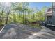 Backyard featuring an open air structure and pool plus large parking area for boats or recreational vehicles at 608 Apache Trl, Woodstock, GA 30189