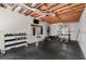 Basement gym featuring exposed beams and workout equipment at 608 Apache Trl, Woodstock, GA 30189