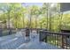 Deck overlooking a wooded area at 608 Apache Trl, Woodstock, GA 30189