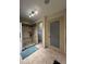 Bathroom with tile shower featuring modern fixtures and sleek design, with a clear glass enclosure at 2926 Summercrest Ln, Duluth, GA 30096