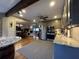 Modern kitchen features granite countertops, stainless steel appliances and a seamless transition to the dining area at 2926 Summercrest Ln, Duluth, GA 30096