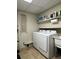 Laundry room with washer, dryer, and utility sink at 2926 Summercrest Ln, Duluth, GA 30096