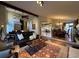 The living room features hardwood floors and an open floor plan that connects it with the dining room at 2926 Summercrest Ln, Duluth, GA 30096