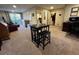 Bright living room features sliding doors and neutral carpet at 2926 Summercrest Ln, Duluth, GA 30096
